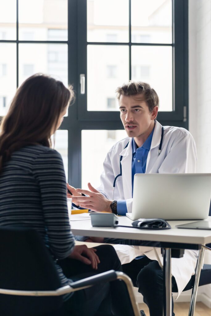 Doctor with patient during medical appointment