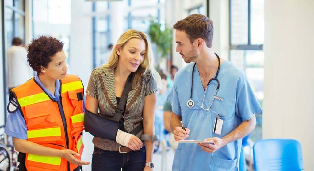 Nurse asking triage question to patient