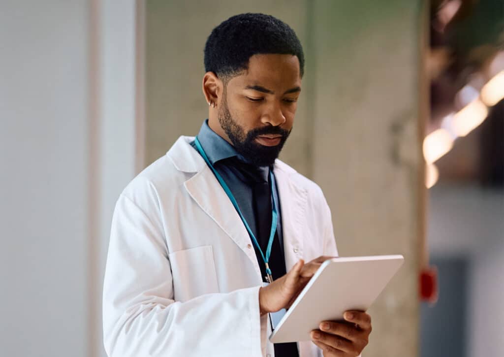 doctor checking salary in tablet