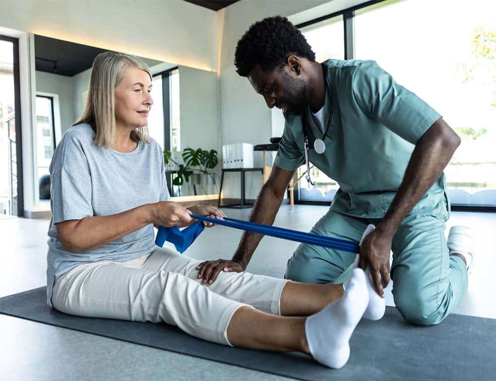Physical therapist in session