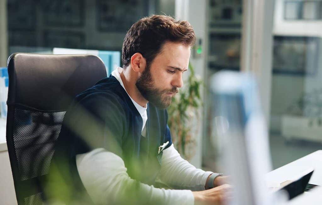 Male nurse checking salary info for RNs in NJ