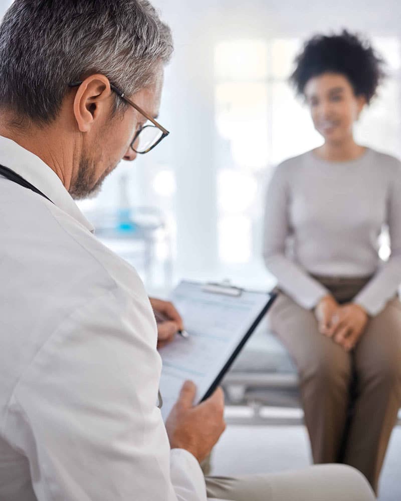 Doctor writing medical record