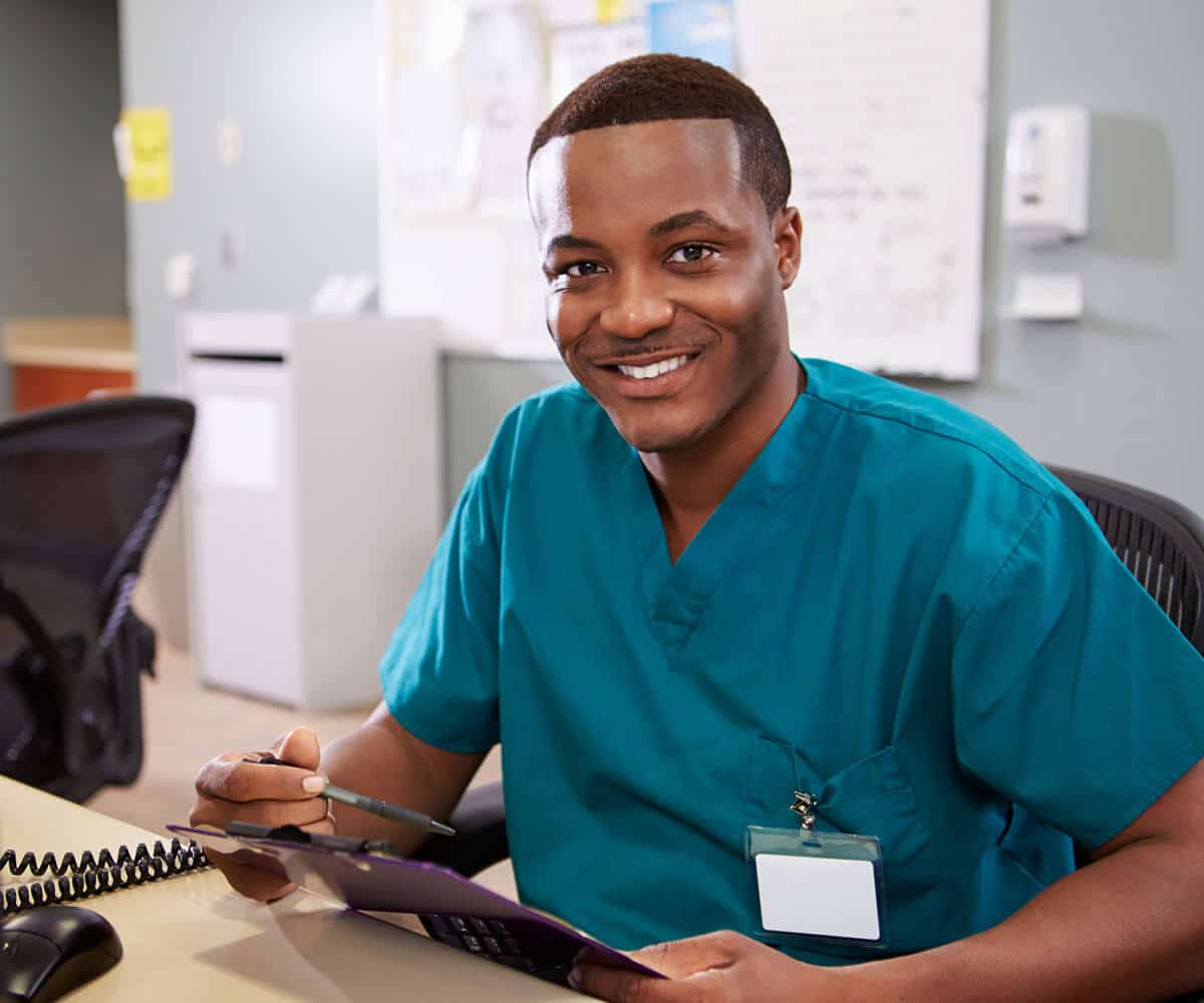 medical assistant working in desk