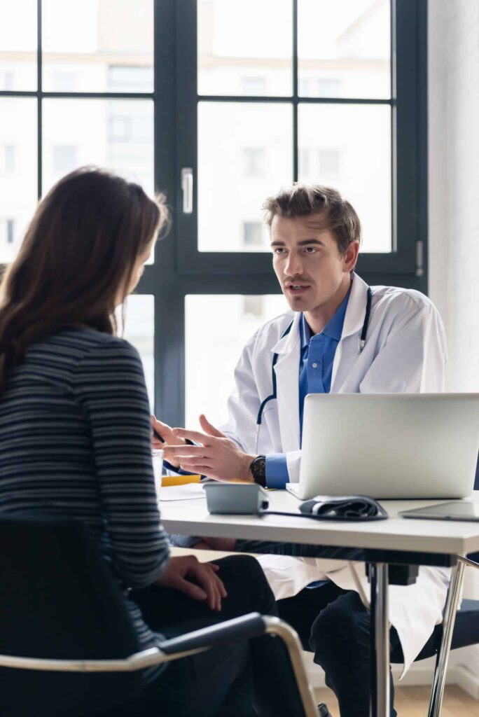 Physician with patient