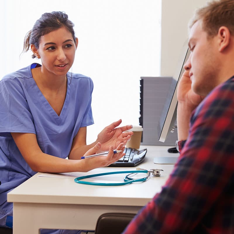 psychiatric nurse practitioner with patient