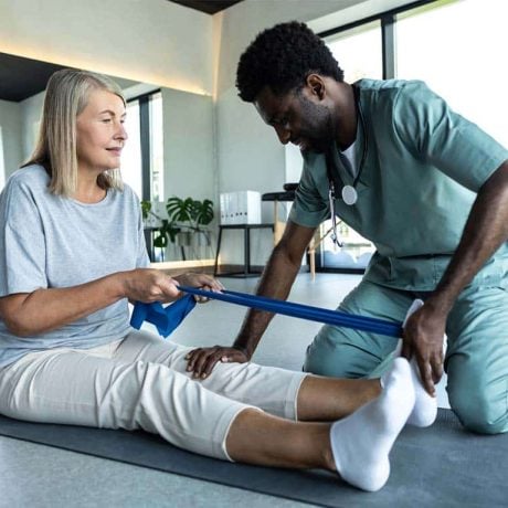 Physical therapist in session